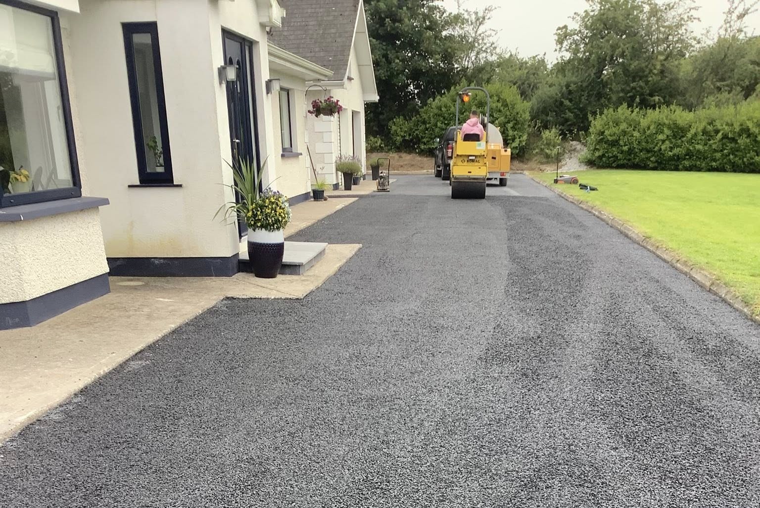 tar and chip driveway being installed