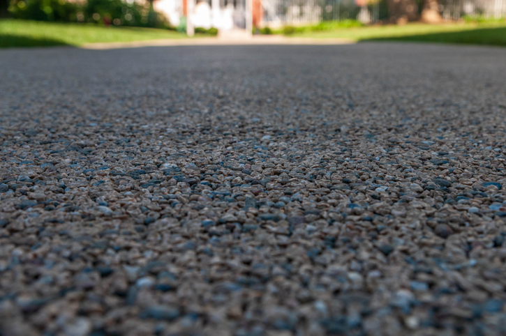 closeup shot of tar and chip driveway
