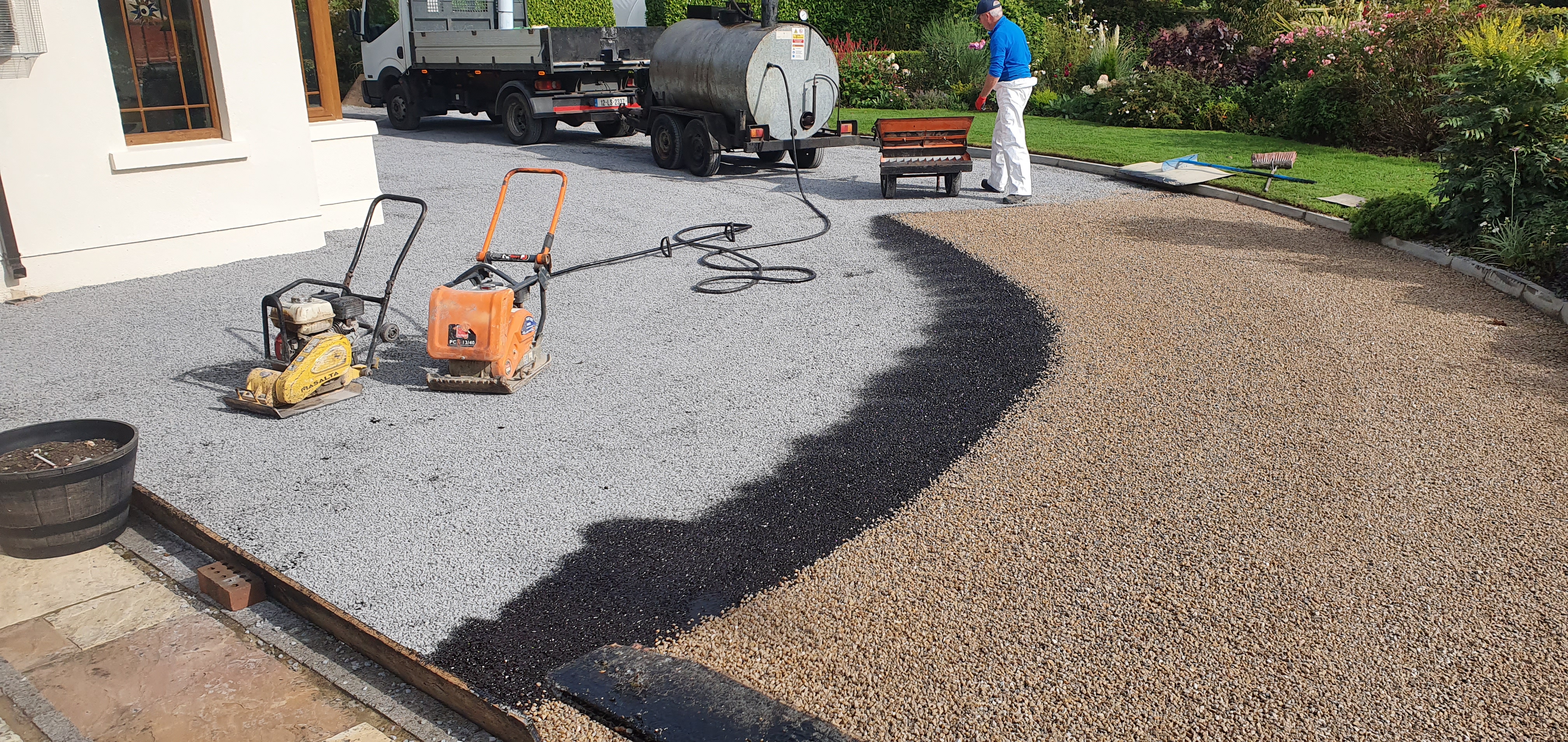 tar and chip driveway being installed